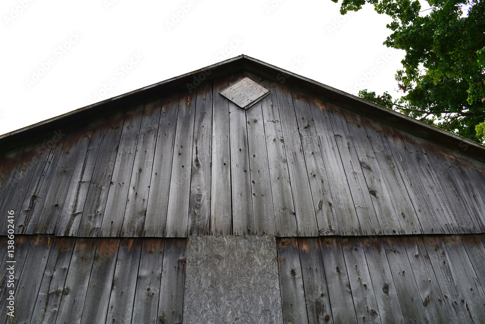Barn. Unfiltered, with natural lighting. An old gray rustic barn.
