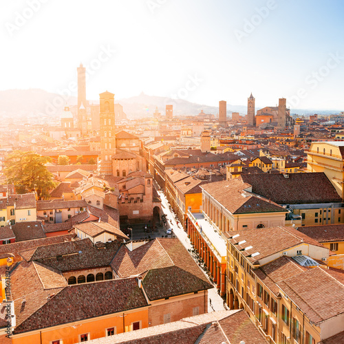 Bologna, cityscape with towers and buildings, San Luca Hill in background