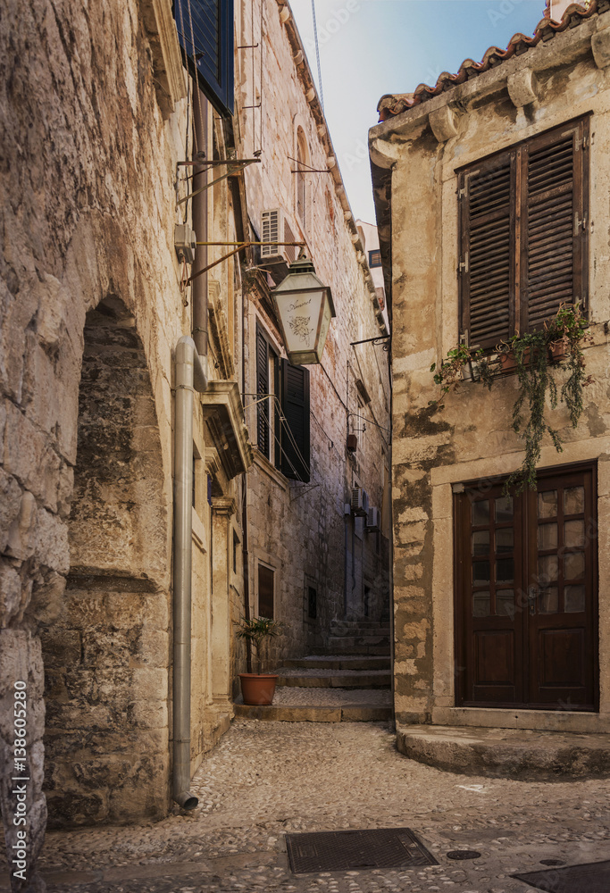Tenement house and narrow street in Old Town Dubrovnik
