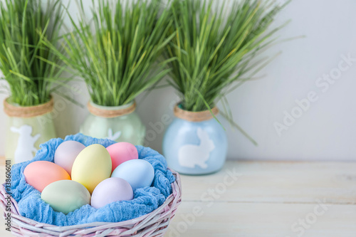Cute creative photo with easter eggs in the nest