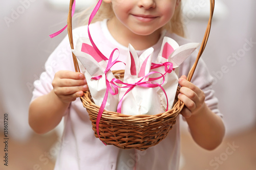 Cute girl holding basket wi...