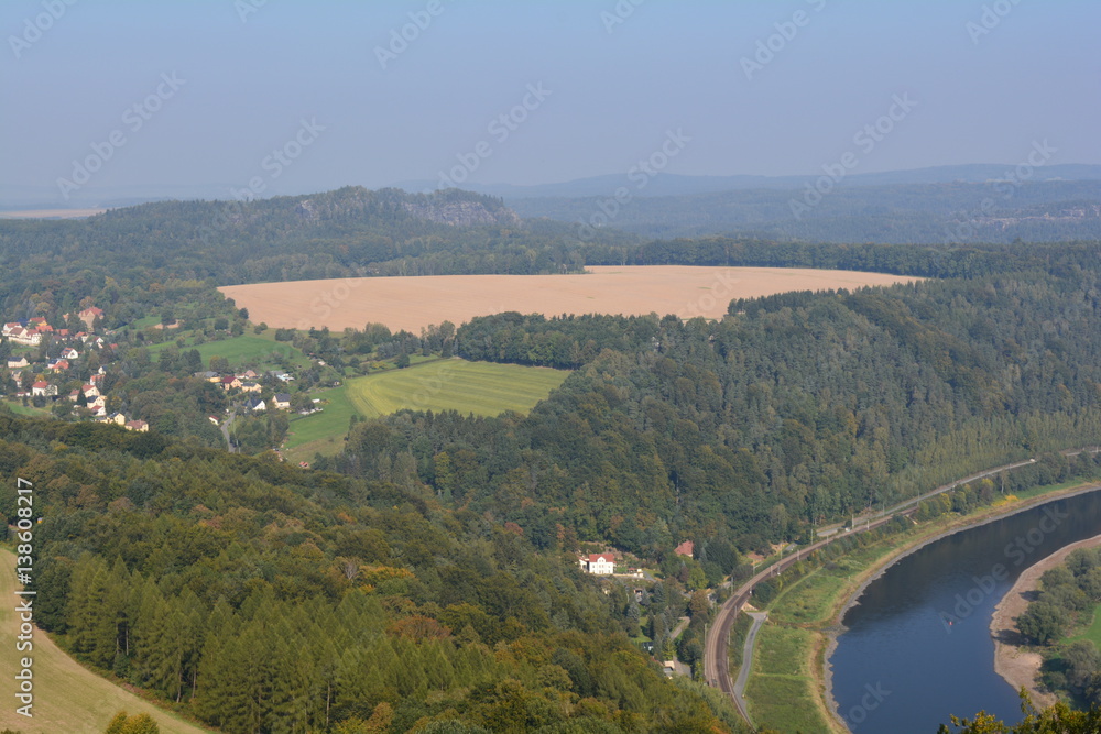 View on Elbe River from Festung Konigstein fortress, Saxon Switzerland, Bavaria, Germany. Famous tourist and travel routes. Natural lighting.