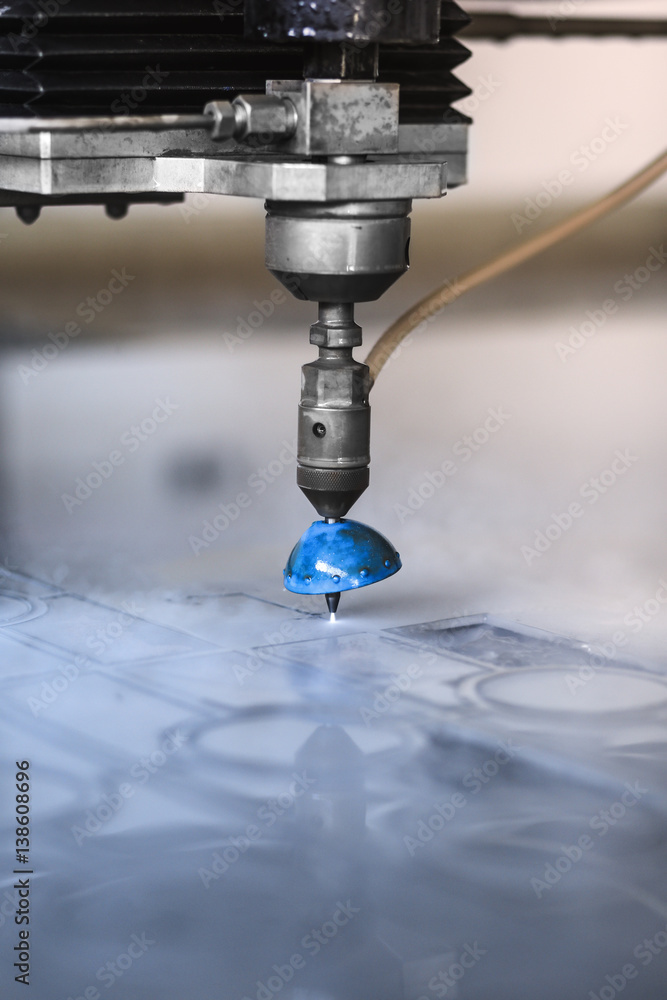 High pressure water jet cutting metal plate. High pressure water jet cutting metal plate.