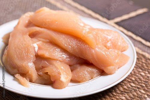 Sliced chicken white meat breasts filet on the plate