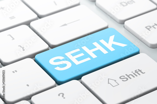 Stock market indexes concept: SEHK on computer keyboard background photo