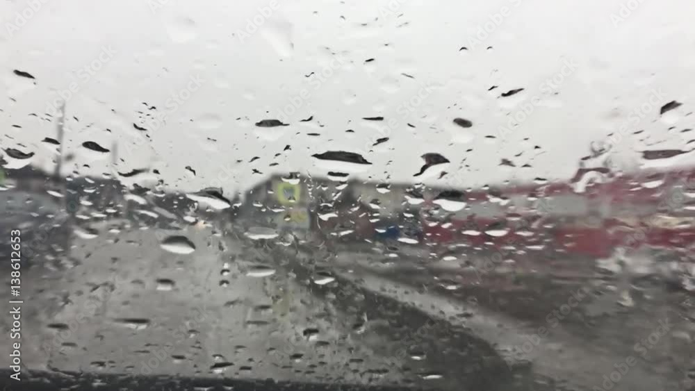 raindrops on the window of the car movement. movement of rain fall raindrops on the window of the car movement. movement of rain fall