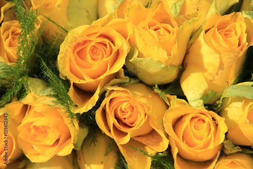 Yellow rose wedding arrangement