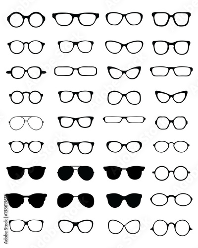 Black silhouettes of different eyeglasses on a white background