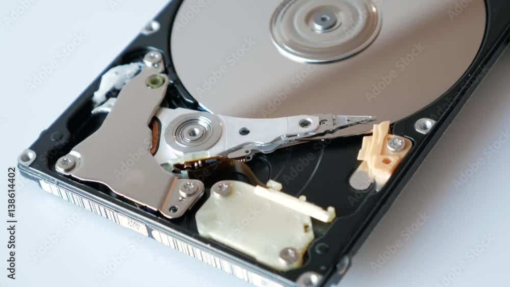 View of disassembled Hard Disk drive spin up and head movement. View of disassembled Hard Disk drive spin up and head movement.