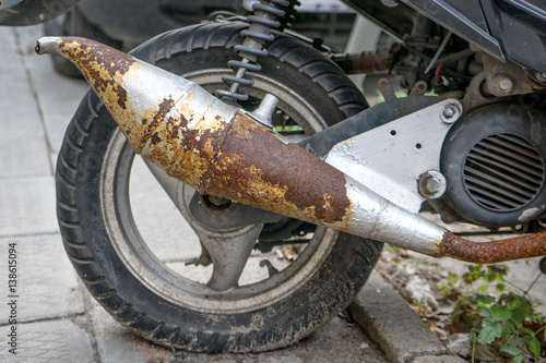 Fototapeta Naklejka Na Ścianę i Meble -  exhaust / Rusted exhaust of a motorcycle