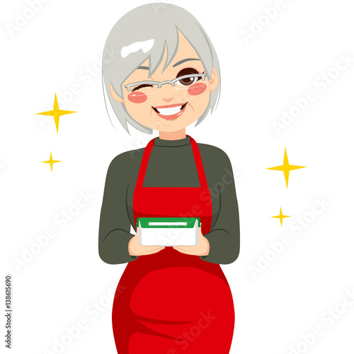 Happy grandmother holding food container with homemade food leftovers and making a wink