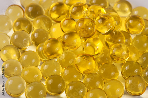 a bunch of fish oil capsules as background