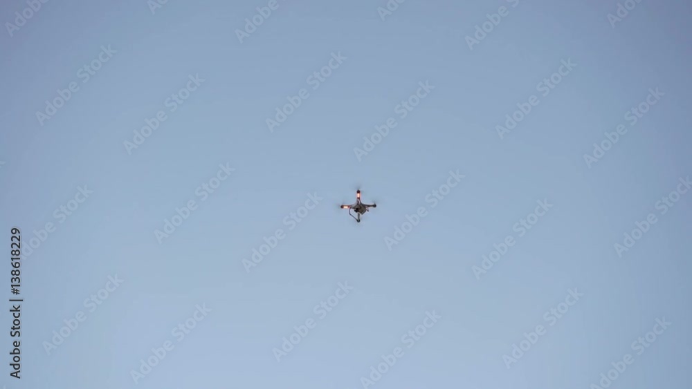 Drone flyes in the sky at the evening Drone flyes in the sky at the evening