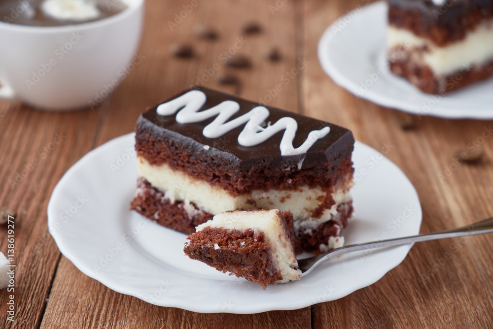 Delicious dessert cake with cream and coffee Delicious dessert cake with cream and coffee