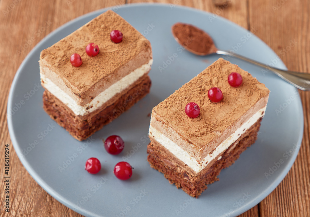 Delicious dessert cake with chocolate cream Delicious dessert cake with chocolate cream
