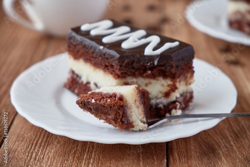 Delicious dessert cake with cream and coffee