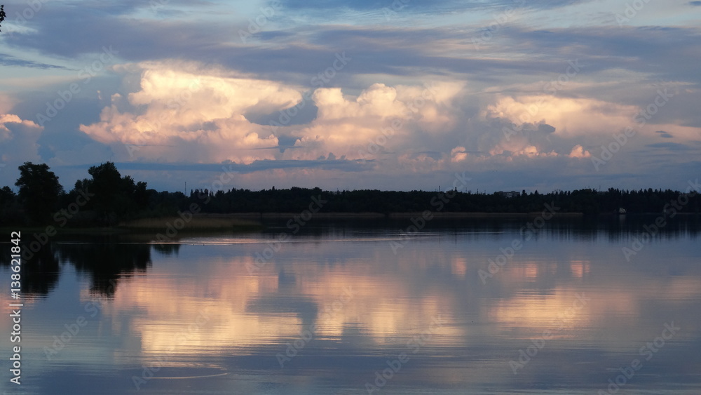 Evening landscape after a thunderstorm .Ukraine , the Dnipro river,the city of New Kakhovka.