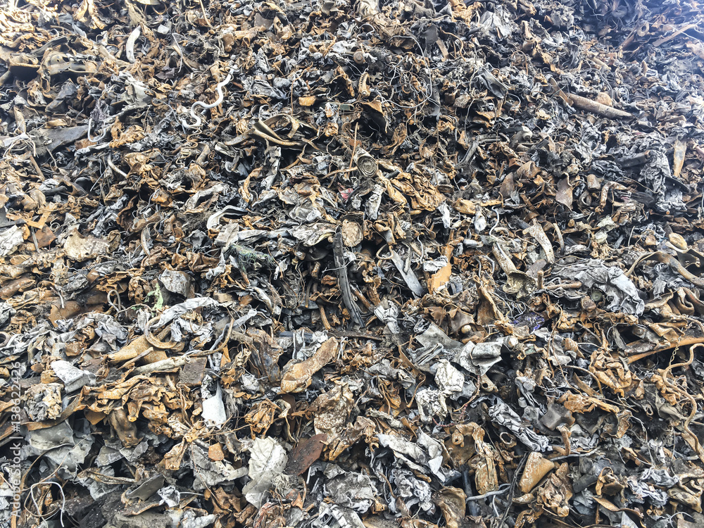 pieces of iron parts from scrapped cars and other metal pieces of iron parts from scrapped cars and other metal