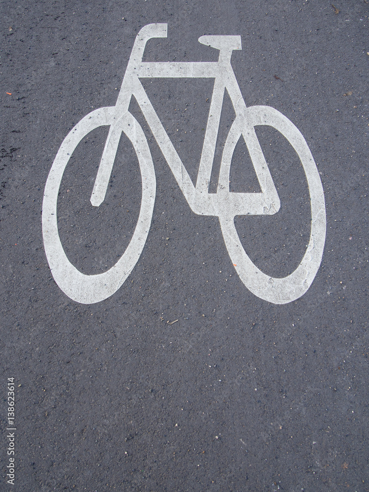Traffic Sign: Bicycle Symbol On An Asphalt Bikeway In Berlin, Germany Traffic Sign: Bicycle Symbol On An Asphalt Bikeway In Berlin, Germany