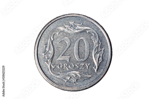 Twenty groszy. Polish zloty. The Currency Of Poland. Macro photo of a coin. Poland depicts a Twenty-Polish groszy coin. Isolated on white background.