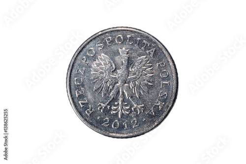 Ten groszy. Polish zloty. The Currency Of Poland. Macro photo of a coin. Poland depicts a Ten-Polish groszy coin. Isolated on white background.