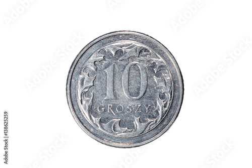 Ten groszy. Polish zloty. The Currency Of Poland. Macro photo of a coin. Poland depicts a Ten-Polish groszy coin. Isolated on white background.