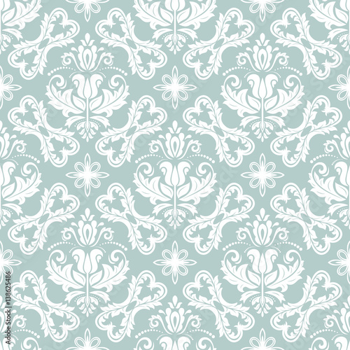 Damask vector classic blue and white pattern. Seamless abstract background with repeating elements. Orient background