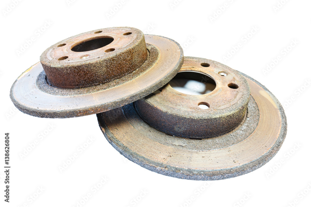 Excessively used rusty brake discs: too thin, covered with rust, with border and with scorched area Excessively used rusty brake discs: too thin, covered with rust, with border and with scorched area