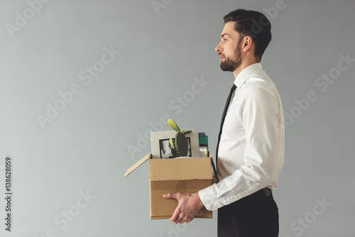 Businessman getting fired photo