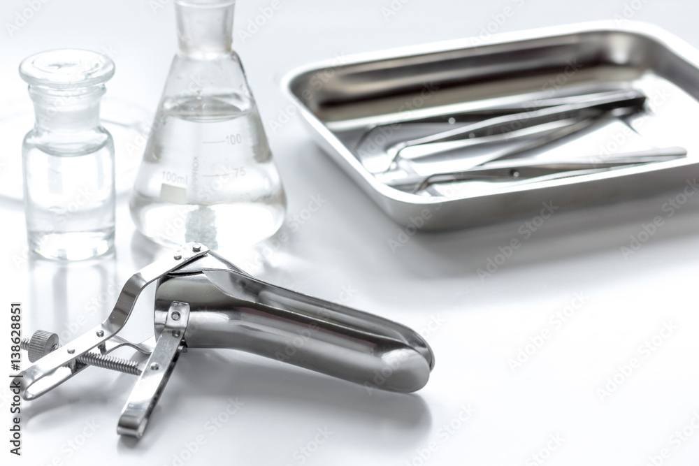 instruments of gynecologist on white background instruments of gynecologist on white background