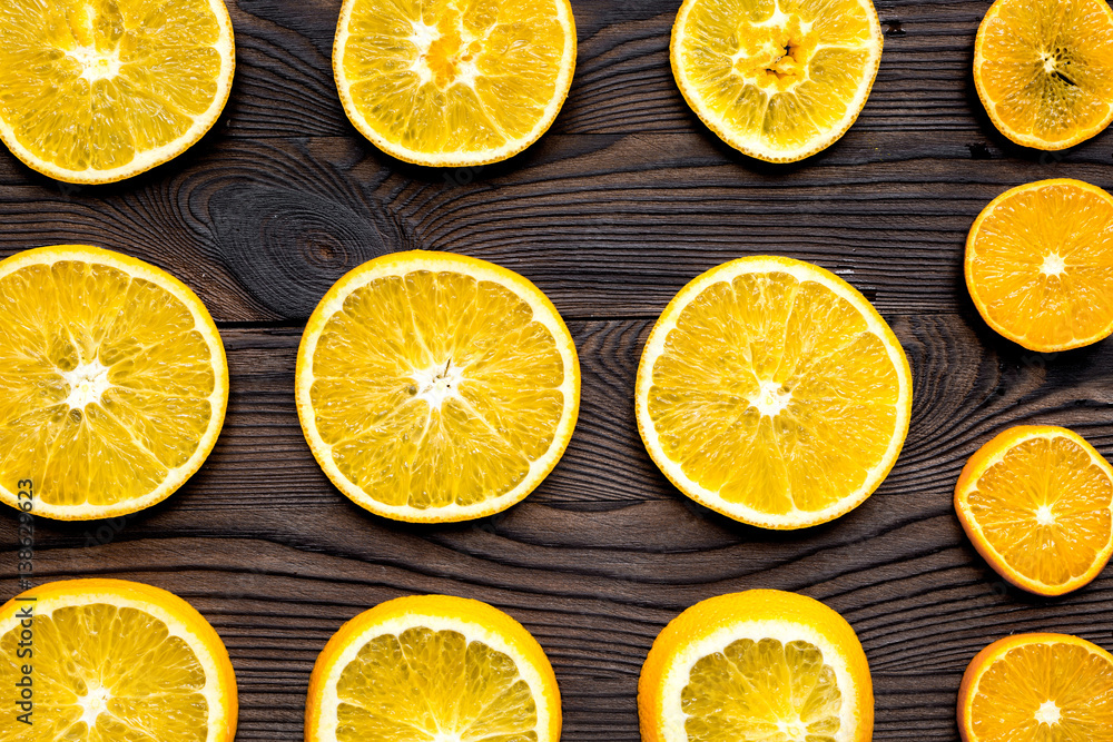 Orange slices with mint on wooden table background top view pattern Orange slices with mint on wooden table background top view pattern