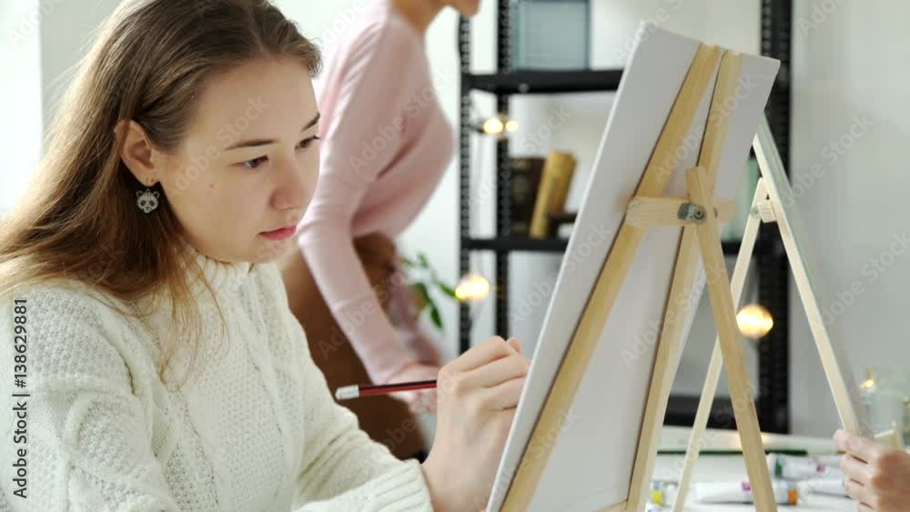 Group of students painting at art lessons 4k 20s Group of students painting at art lessons 4k 20s