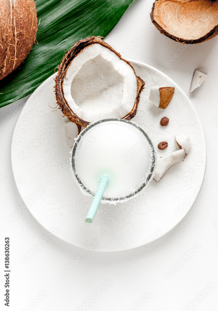 cocktail with coconut on white background top view cocktail with coconut on white background top view