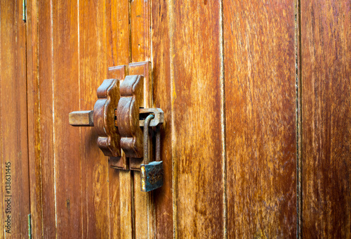 Wooden cabinet and lock at the door handle