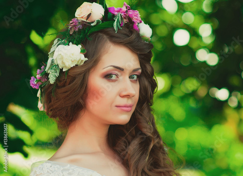 Wedding hairstyle and bride's make-up photo