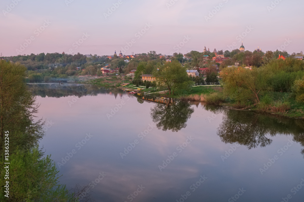 Spring evening landscape with the river and a small town on the shore.River Osetr and the city of Zaraysk in Moscow region Spring evening landscape with the river and a small town on the shore.River Osetr and the city of Zaraysk in Moscow region