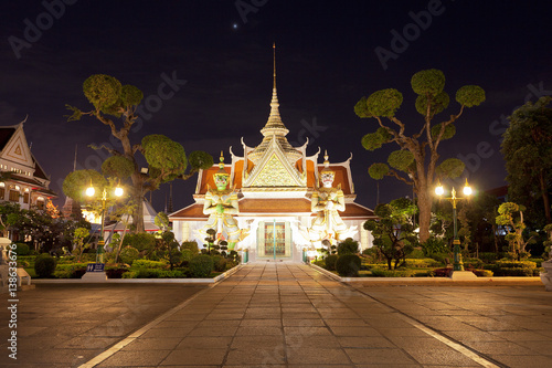 Temple and garden near Wat Arun at night  © pop_gino