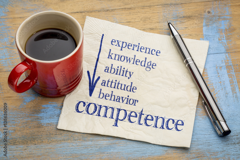 competence concept on napkin with coffee competence concept on napkin with coffee