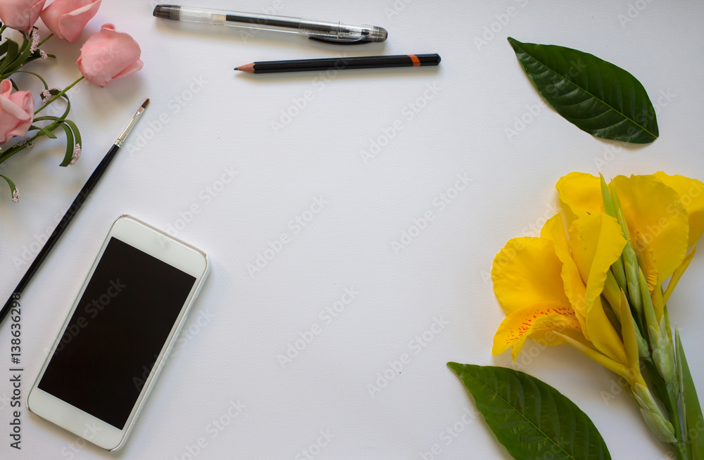 White paper background with flowers and leaves. White paper background with flowers and leaves.