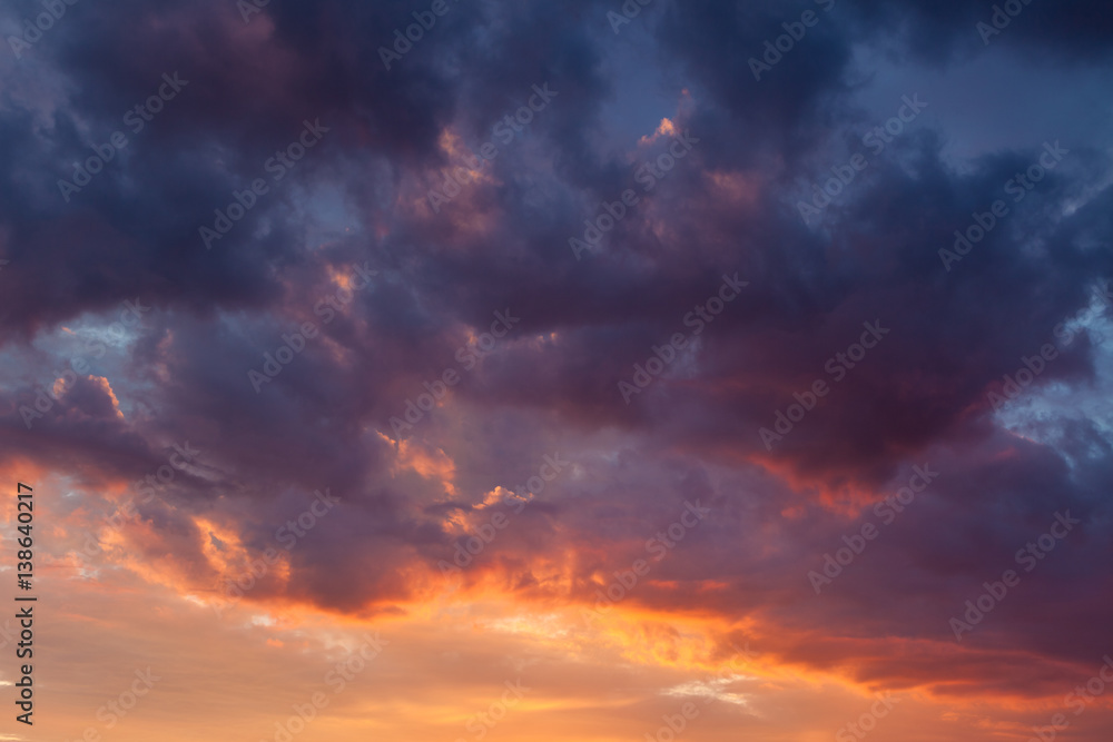 Fiery vivid sunset sky clouds