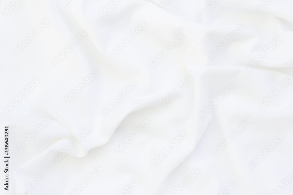 Close up of white bedding sheets and copy-space.