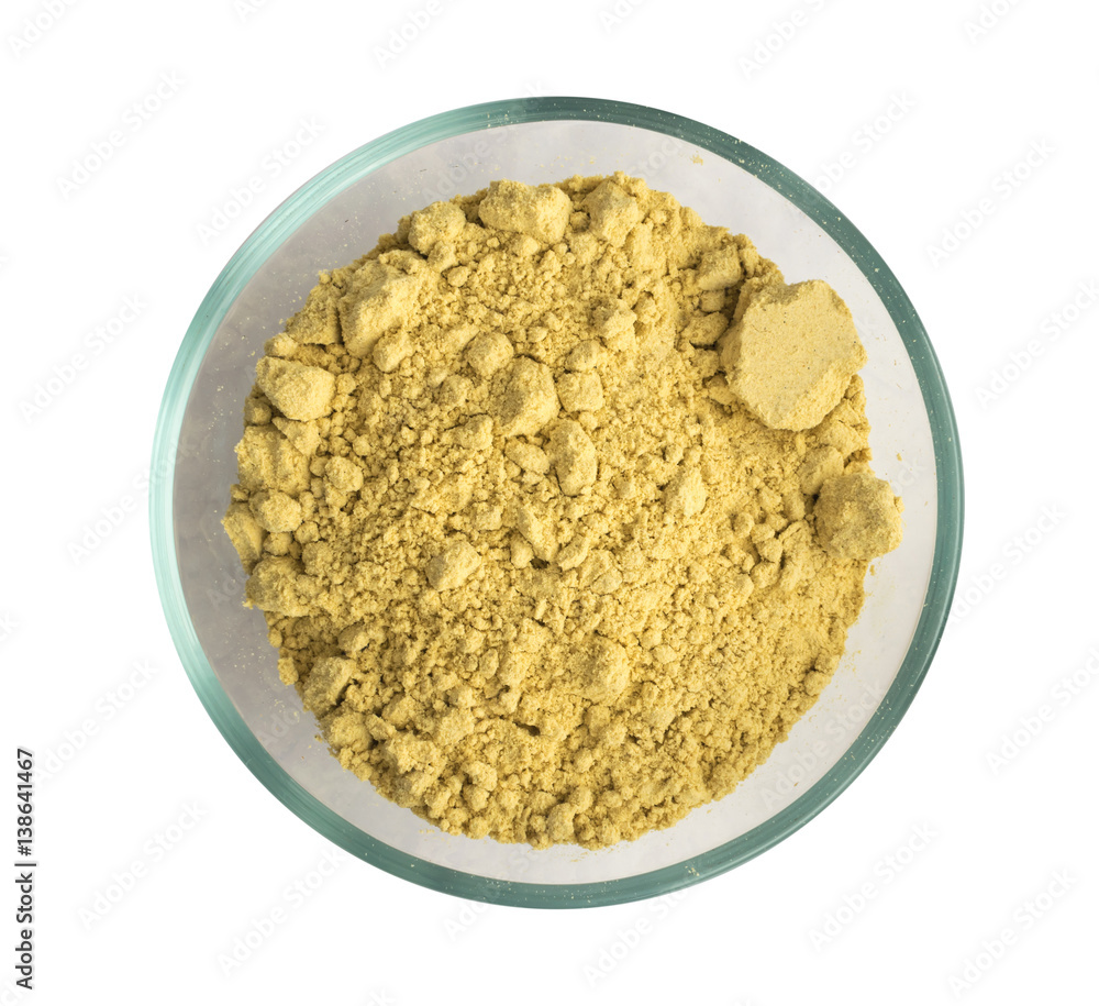 Mustard Powder in Round Glass Bowl Isolated on White Background Mustard Powder in Round Glass Bowl Isolated on White Background