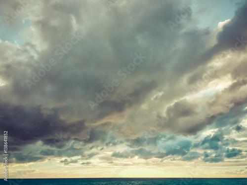 Clouds over sea - minimalistic sunset landscape