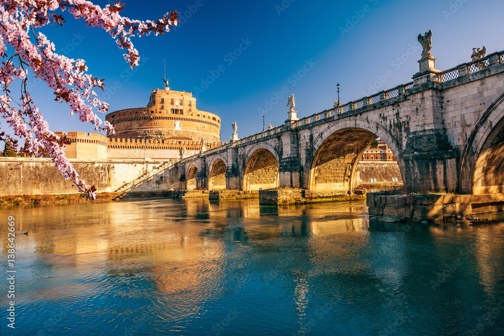 Obraz premium Saint Angel Castle and bridge over the Tiber river in Rome