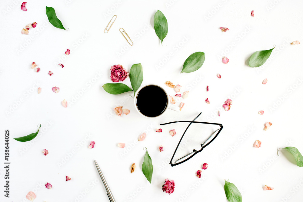 Red rose bud, glasses, leaves, coffee on white background. Entrepreneur or beauty blogger home office table desk workspace. Flat lay, top view Red rose bud, glasses, leaves, coffee on white background. Entrepreneur or beauty blogger home office table desk workspace. Flat lay, top view