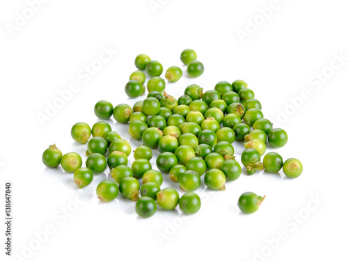 Fresh green peppercorns isolated on white background