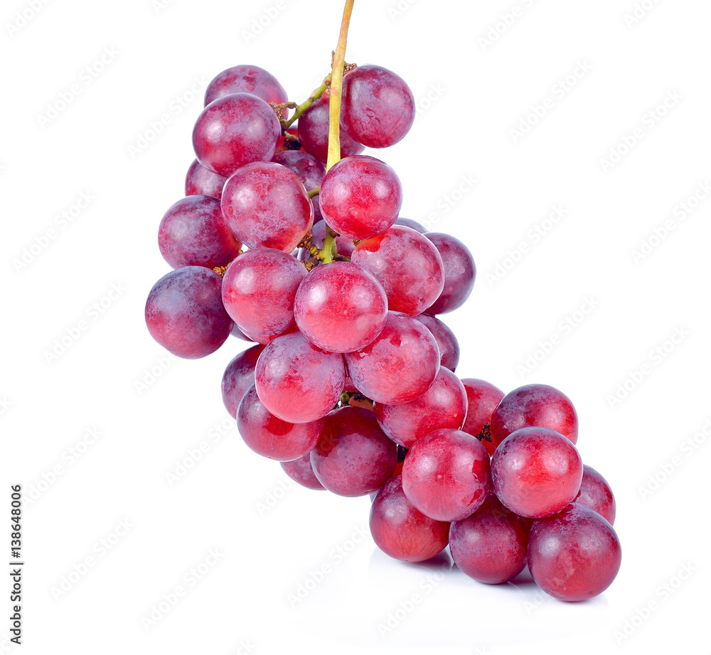A bunch of red grapes on a white background A bunch of red grapes on a white background