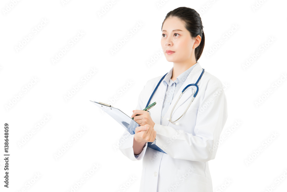 asian doctor holding pen writing medical case on clipboard asian doctor holding pen writing medical case on clipboard