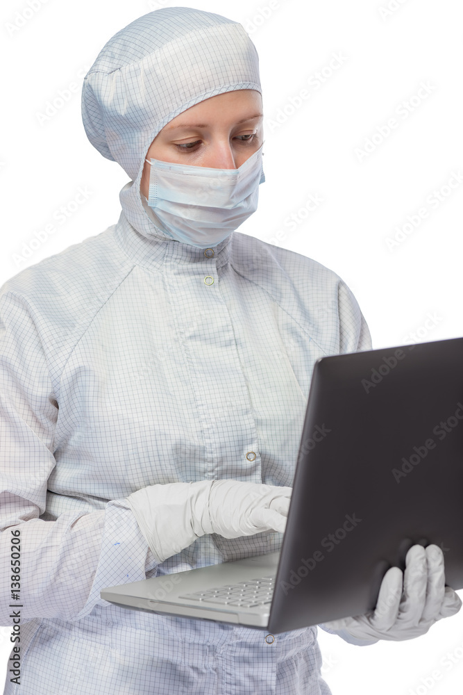 Vertical portrait of a lab assistant with a computer on a white background in suit