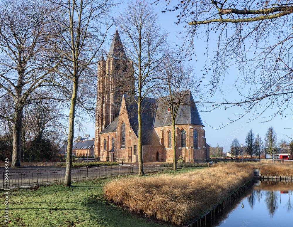 Εκτύπωση καμβά Gothic Saint Michael church at sunny daybreak, Ravels, Flanders, Belgium